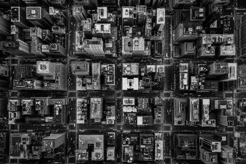 Aerial city grid representing dual-audience software